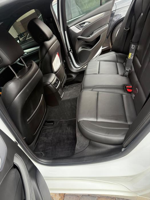 Cadillac CT5 black leather rear seats after a deep interior clean