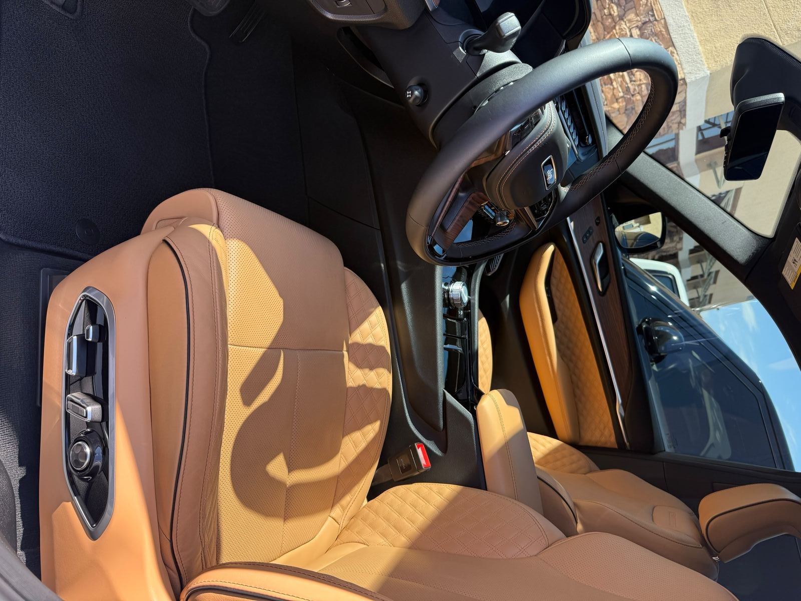 Jeep Grand Cherokee tan quilted leather front seats after conditioning