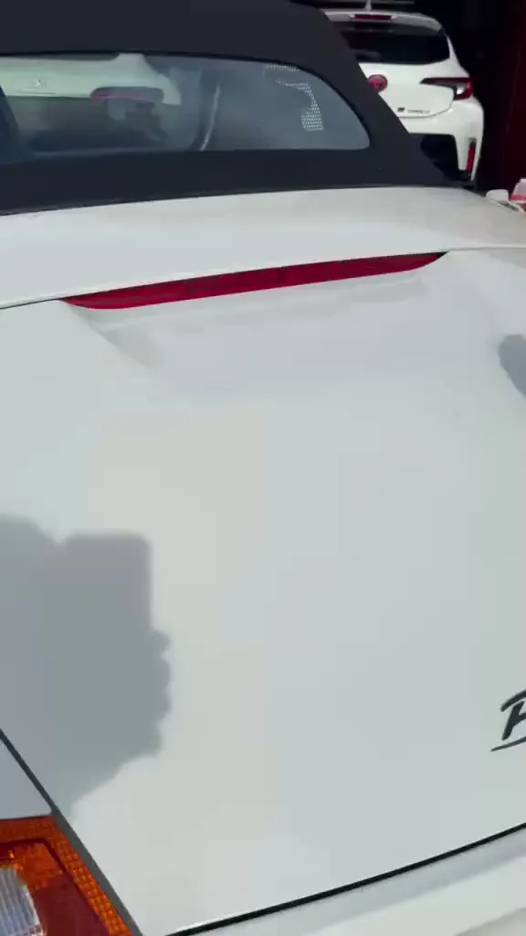 Clay bar pulling bonded contaminants off the paint before coating