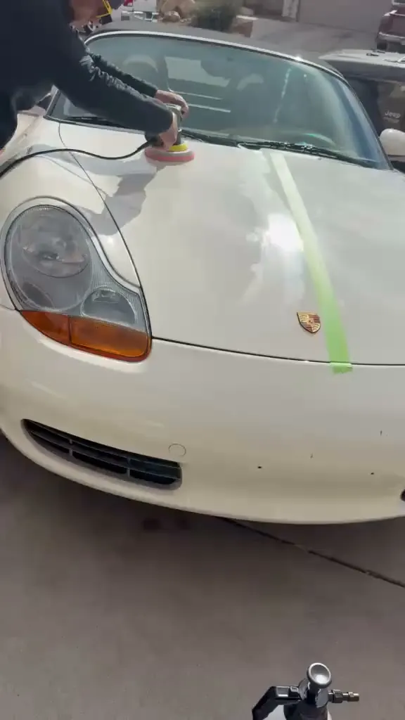 Machine polisher correcting the paint ahead of the ceramic coating