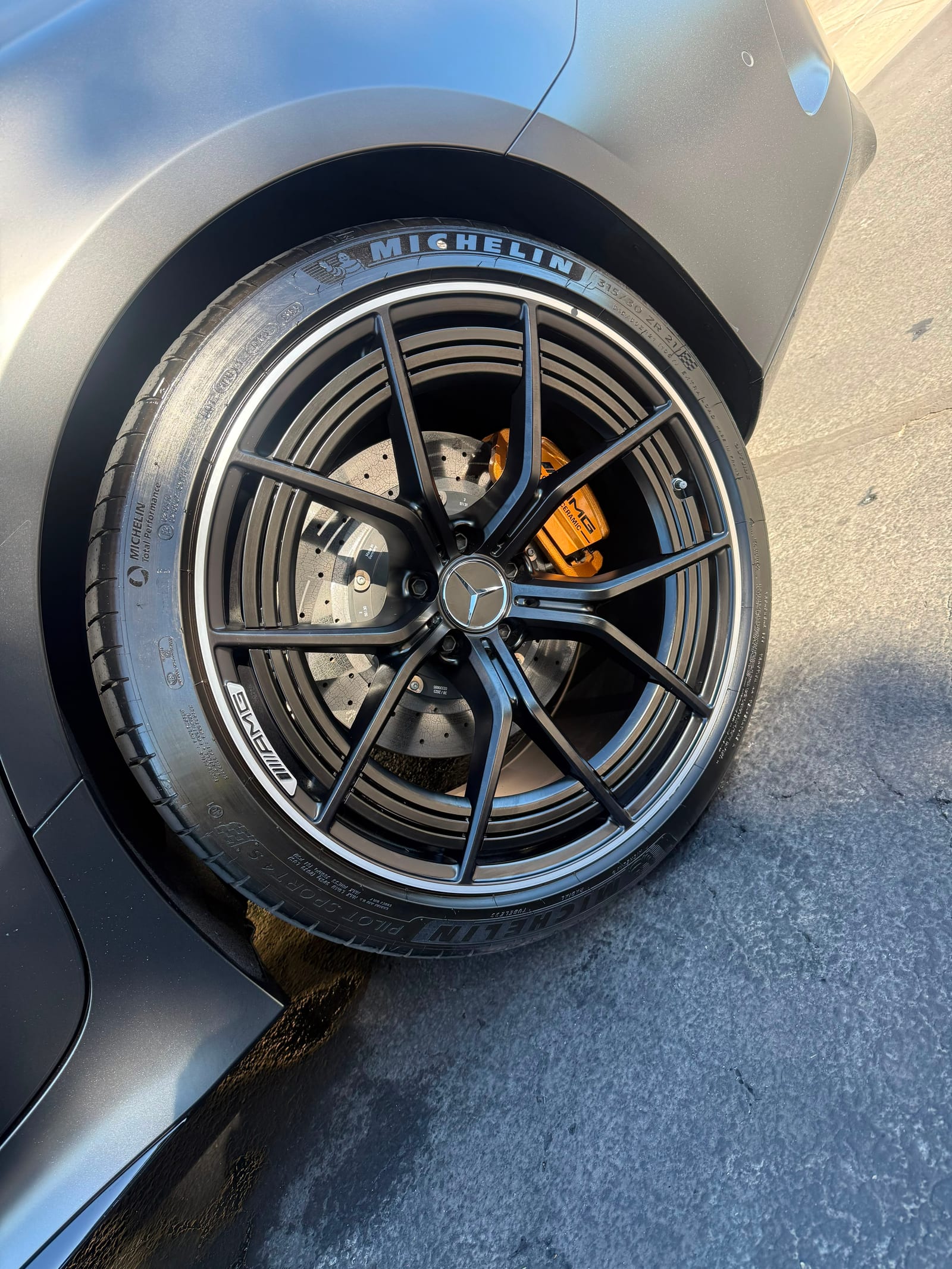 Mercedes-AMG GT rear forged wheel and gold brake caliper cleaned face, barrel and tyre