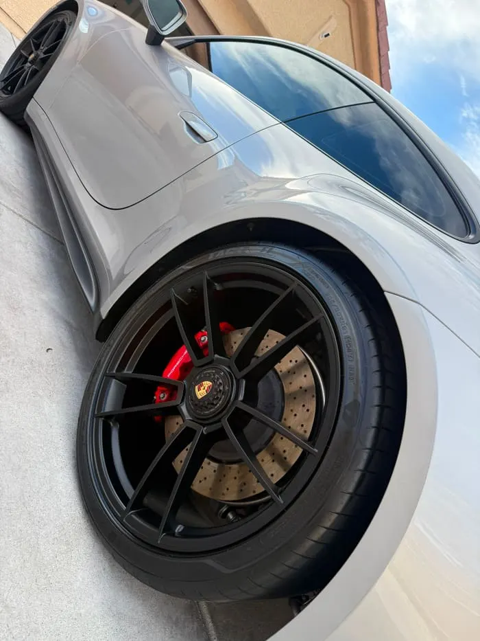 Porsche 911 Turbo S rear quarter and wheel after a decontamination wash